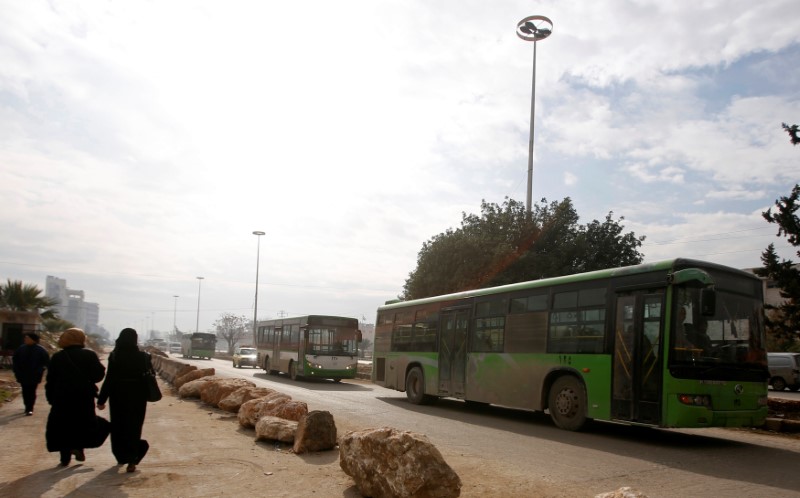 Aleppo evacuation resumes after Syrian rebels, pro-government forces reach deal