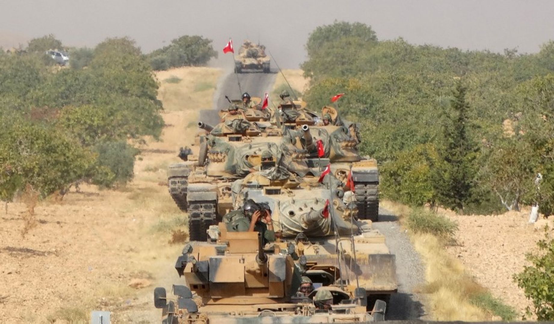 Turkey ratchets up Syria offensive, says warplanes hit Kurdish militia