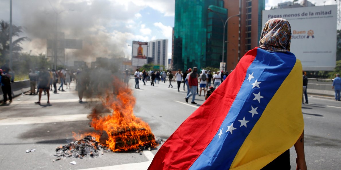 After huge Venezuela protest march, government says foils coup