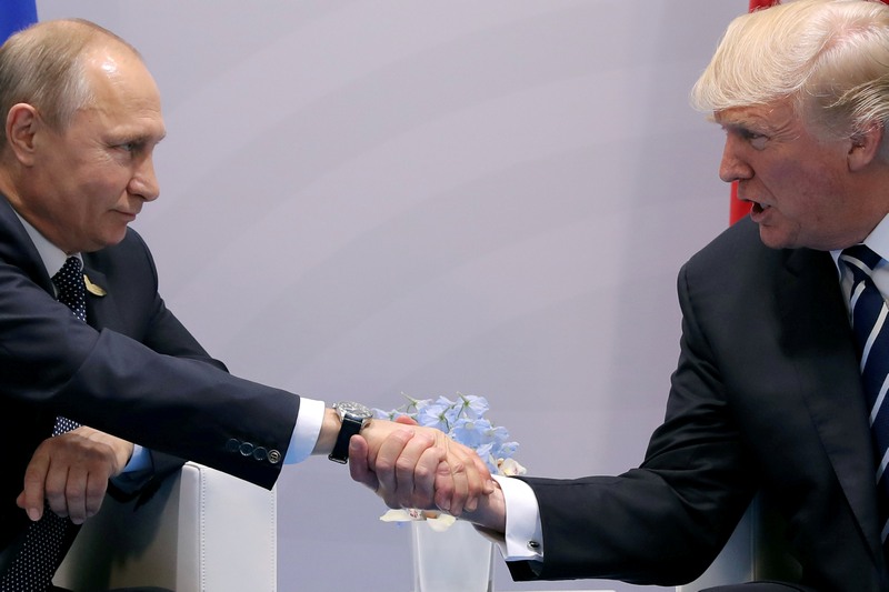 Trump signs Russia sanctions bill, Moscow calls it 'trade war'