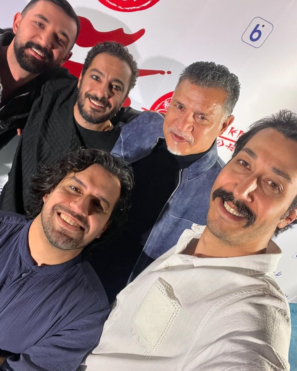 عکس جذاب علی دایی با نوید محمدزاده در کنسرت نمایش سیصد