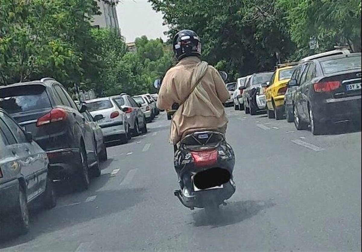 موتور سواری خانم چادری در خیابان‌های تهران+ فیلم