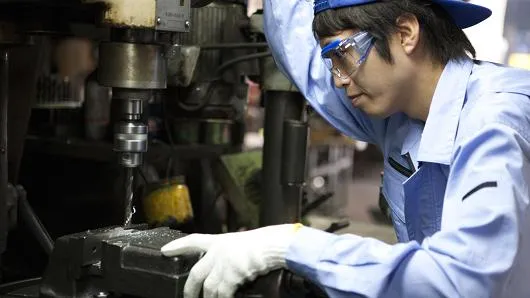 Japan October core machinery orders rise, beating expectations