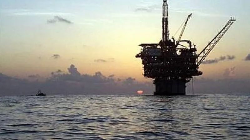 Oil prices edge up on expected U.S. crude inventory draw