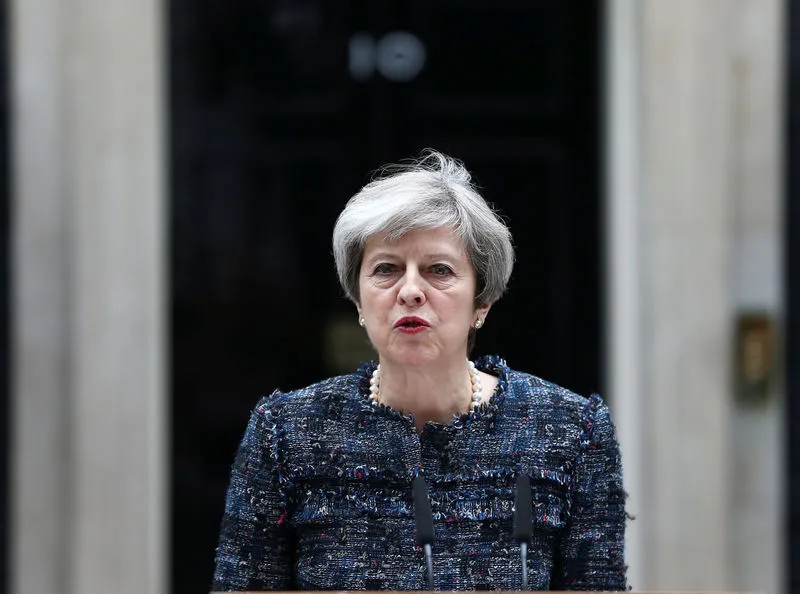 UK PM Theresa May maintains strong election lead in weekend opinion polls