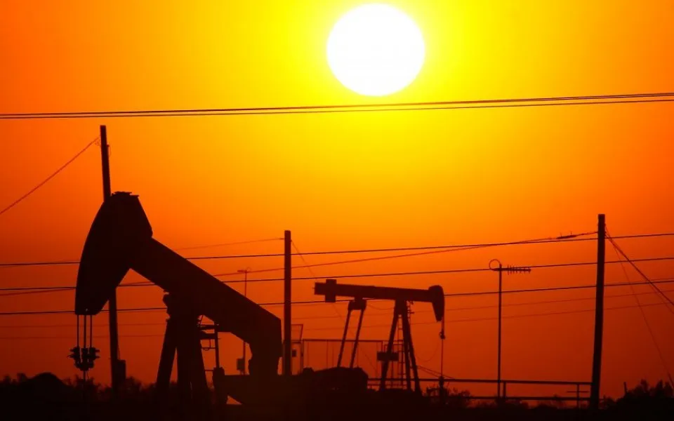 Oil falls close to three-month low as oversupply weighs