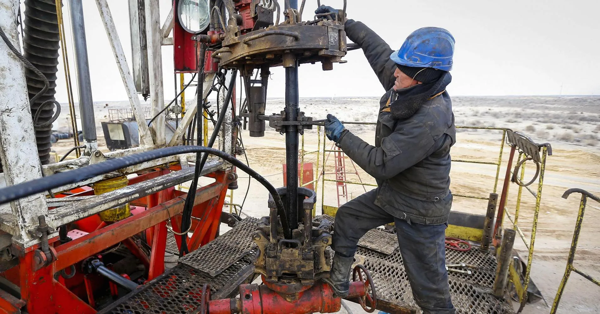 Oil prices reverse early losses, but glut worries cap gains