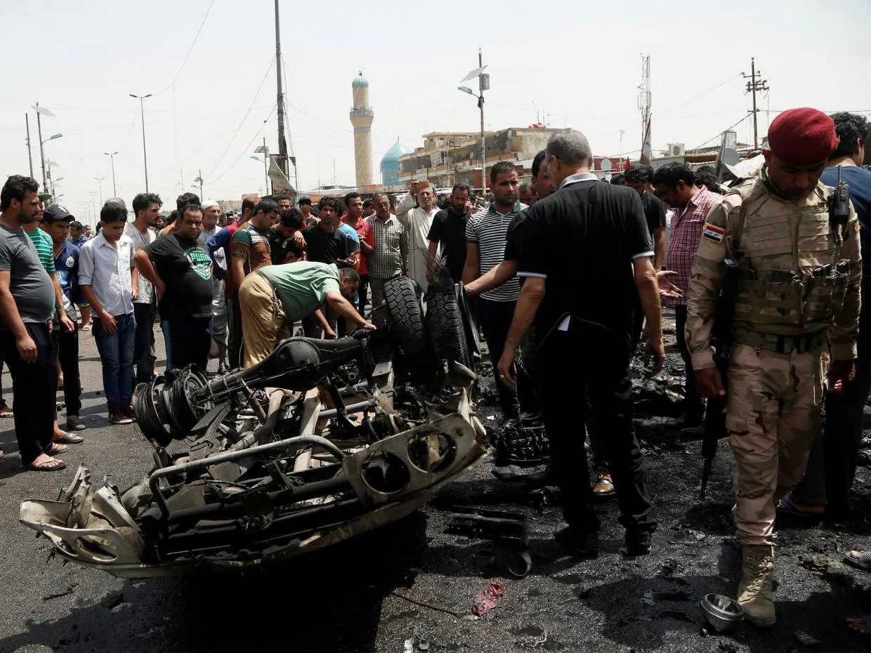 Explosions in and around Baghdad kill 12: police, medical sources