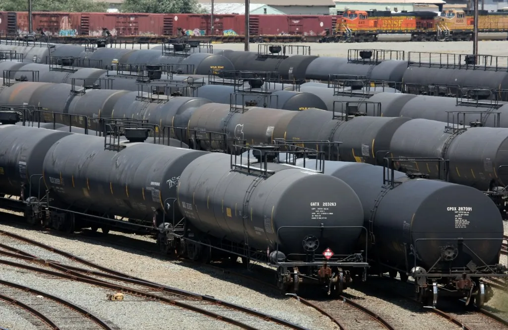 U.S. crude edges back over $40, but oversupply still weighs