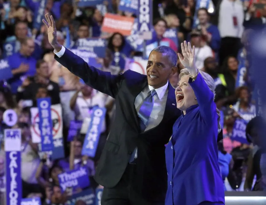 Obama urges Americans to get behind Clinton, slams Trump