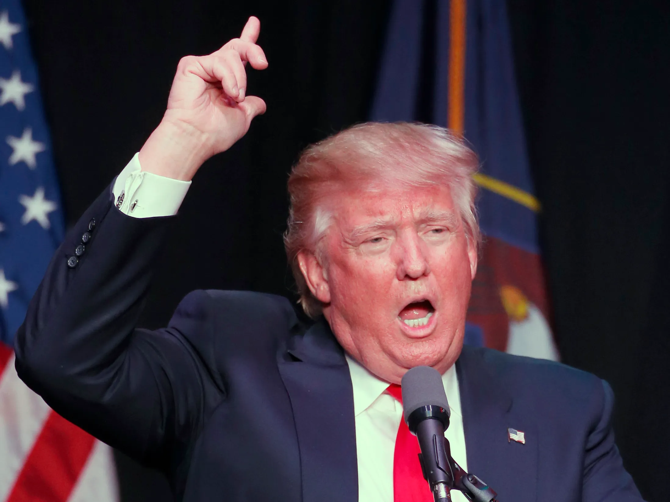 Trump attacks Clinton on trade, says he should be handed victory