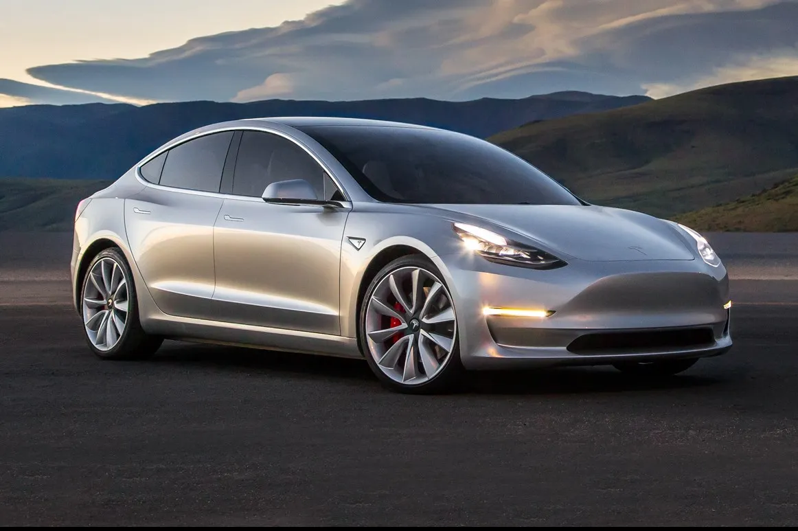 Elon Musk tweets photos of first Tesla Model 3 to roll off the line