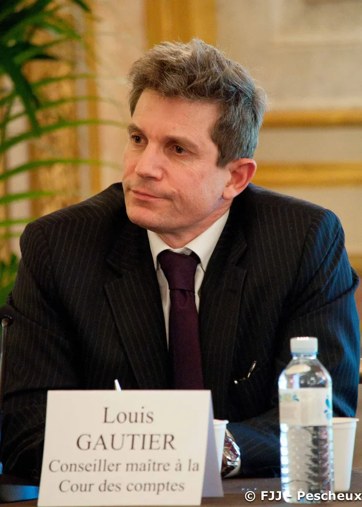 France urges removal of sanctions against Iran